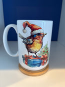 Mug 15oz. Custom-made Robin with Santa Hat on a Blue Present with Lid/Coaster