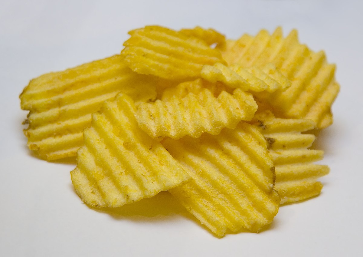 McCoys Large Grab Bag Cheddar &amp; Onion Flavor Ridge Cut Crisps 45g Bag. Savor the delicious and creamy cheddar paired with the bold flavor of onion in every bite.